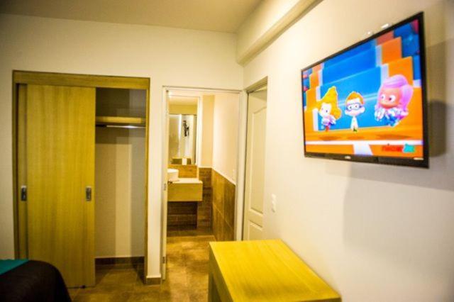 Hm Hotel Мансанильо Экстерьер фото
